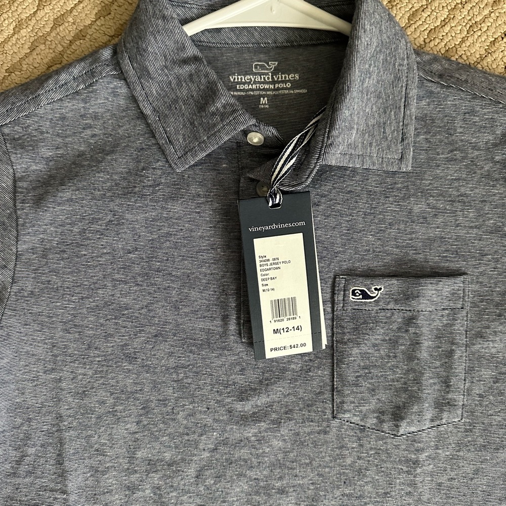 New with tags.  Looks gray in picture, but it is navy blue.